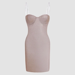 Detail of rose gold glitter bodycon dress showing shimmering fabric and rhinestone trim