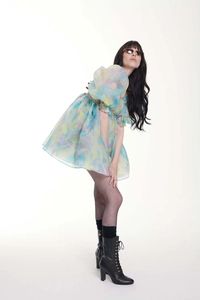 Detail of floral organza puff sleeves and pastel macaron print on vintage style dress