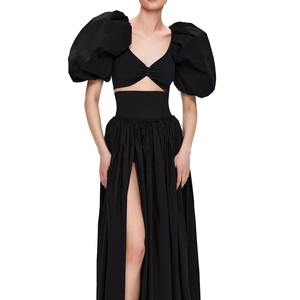 Elegant black two-piece set with puffed sleeves and high-slit long skirt dress