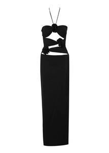 Detail view of a black halter maxi dress with cutout design and 3D floral accents