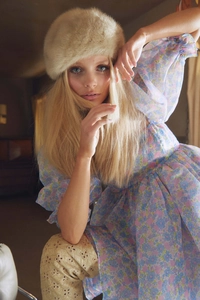 Detail of floral puff sleeve mesh dress with retro court style texture and patterns