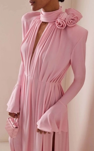 Detail of pink vintage dress with 3D flower shoulder decor and plunging pleated neckline