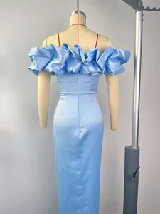 Close-up of light blue satin dress with off-shoulder ruffles and back zipper detail