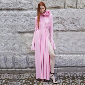 Elegant pink maxi dress with high neck, long sleeves, and large 3D rose shoulder accents