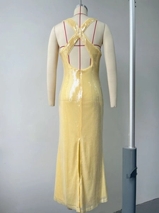 Detail of cross straps backless design on light yellow sequin formal evening dress
