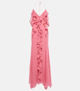 Detail of pink halter neck dress featuring ruffled layers and elegant deep V-neckline