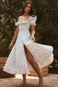 Detail of floral puff sleeve dress showing square neckline and drawstring ruched bust