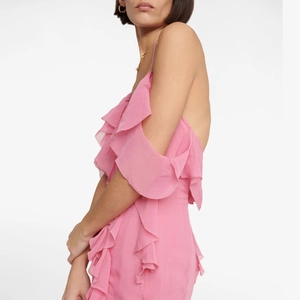Pink halter neck maxi dress with ruffled layers and elegant open back for women