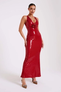 Close-up of red sequin dress featuring a deep V-neck and 3D floral rose applique