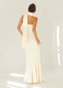 Detail of cream backless mermaid dress with vertical texture and long neck scarf