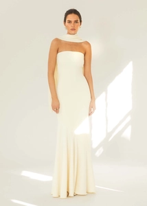 Detail of off-white halter neck mermaid dress with elegant pleated texture and ruffles