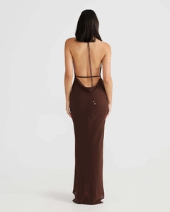 Detail of elegant backless brown long dress with cowl back and thin halter straps