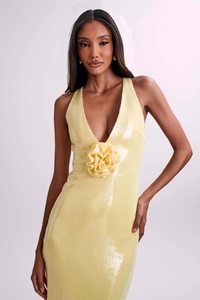 Detail of sequins and handmade 3D flower on backless evening dress with plunging neckline