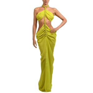 Lime green chiffon halter dress with chain detail and waist cut-outs in long evening style