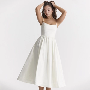 Elegant white backless midi A-line dress with spaghetti straps and pleated waist design