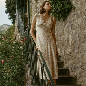 French vintage floral V-neck midi dress with ruffled lace details and tied waist