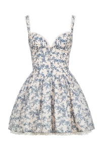 Détail de la robe corset à fleurs bleues avec bordures en dentelle et boutons