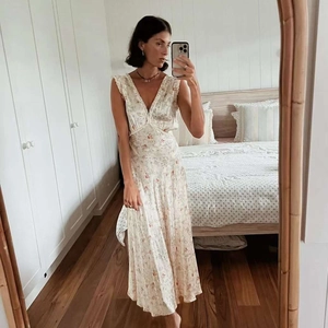 French style floral V-neck maxi dress with tie waist and ruffled lace details in cream color