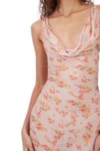Detail of elegant cowl neck and delicate floral print on light pink chiffon maxi dress