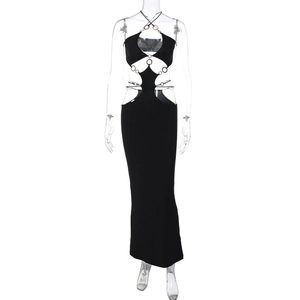 Sexy black cutout bodycon maxi dress with metallic rings and cross halter neck style