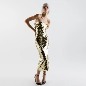 Elegant gold sequin bodycon maxi dress with thin spaghetti straps for formal party wear
