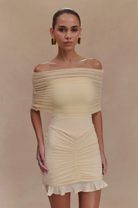 Detail of ruched off-shoulder mini dress with mesh neckline and tiered ruffle hem