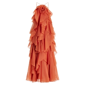 Orange halter maxi dress with layered ruffles and oversized floral neck detail