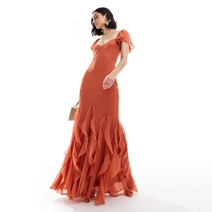 Elegant rust orange V-neck maxi dress with ruffled hem and flutter sleeves for summer