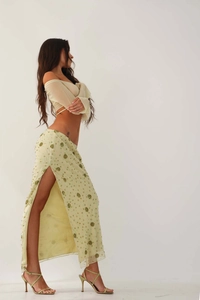 Detail of sequin embroidery and beadwork on the high-slit side of the vacation maxi skirt