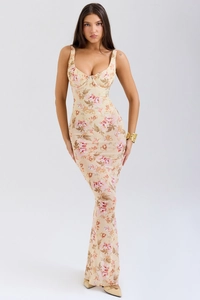 Full-length view of a slim-fit floral fishtail dress with spaghetti straps and a square neck