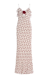 Detail of red rose decor and ruffle neckline on white polka dot summer slip dress