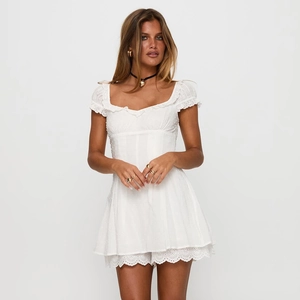 Elegant white square neck dress with lace trim and polka dot jacquard texture