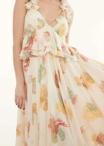 Detail of V-neck ruffled strap dress with colorful seashell and coral marine pattern