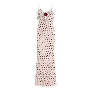 Polka dot summer maxi dress with deep V-neck, ruffles and a red rose decoration