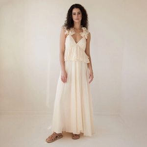 Elegant beige V-neck long dress with ruffled lace details and flowing tiered skirt design