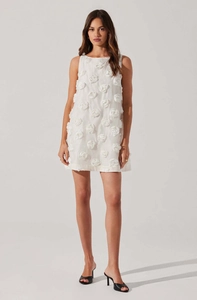 Close-up of textured white sleeveless mini dress with 3D floral rose appliques