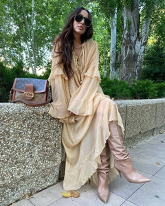 Detailed view of bohemian ruffled chiffon long dress with flare sleeves and V-neckline