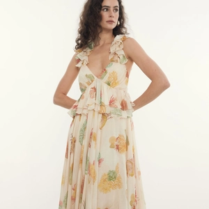Resort style deep V-neck maxi dress with tiered ruffles and marine coral seashell prints