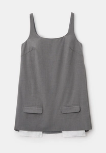 Detailed view of grey square neck mini dress with side flap pockets and raw edge hem