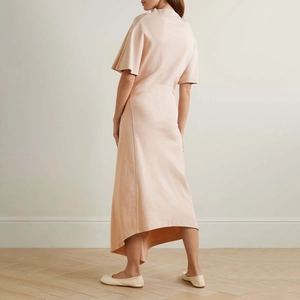 French casual midi dress with short sleeves and asymmetrical pleated hem in nude pink