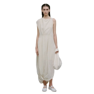Elegant sleeveless cream long dress with knot hem detail and textured linen fabric for summer
