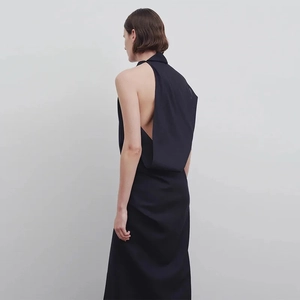 Minimalist black sleeveless backless maxi dress with asymmetric draped neckline