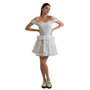 White off-shoulder smocked mini dress with embroidery and tiered ruffle details