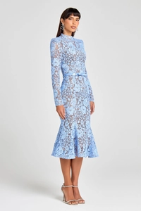 Detail of light blue lace dress showing sheer hollow embroidery and mermaid hem design