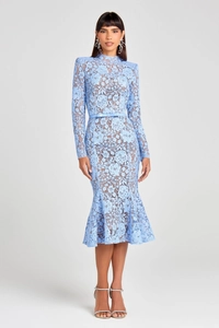 Detailed view of light blue floral lace fabric on a long-sleeved evening dress