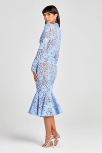 Close-up of light blue lace gown showing intricate floral patterns and elegant mermaid hem