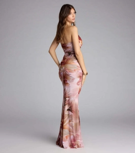 Detailed back view of floral fishtail dress showing mesh ruching and mermaid hemline