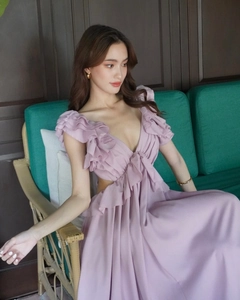 Detail view of lavender ruffle V-neck dress with bow-tie and waist cut-out accents