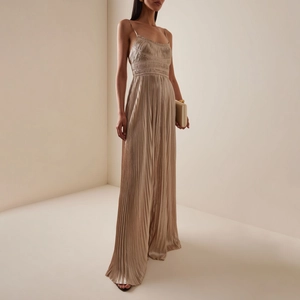 Elegant champagne gold pleated maxi dress with spaghetti straps and a high waist design