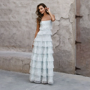 Elegant light blue tiered lace maxi dress with delicate embroidery for summer vacations
